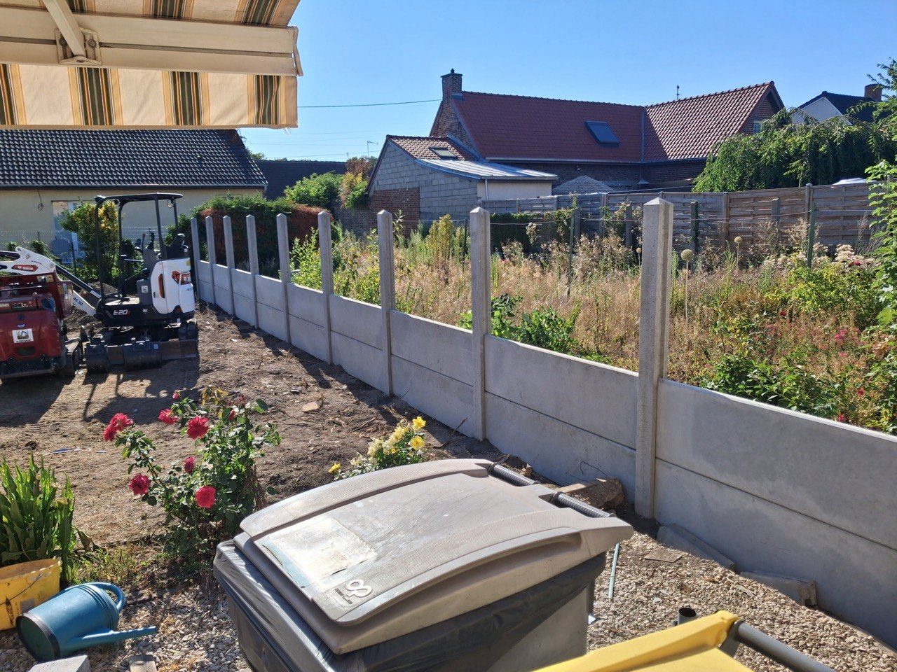Pose des poteaux et premières plaques béton à Roeux – Hpaysage